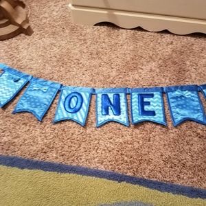 Birthday banner and chalkboard sign